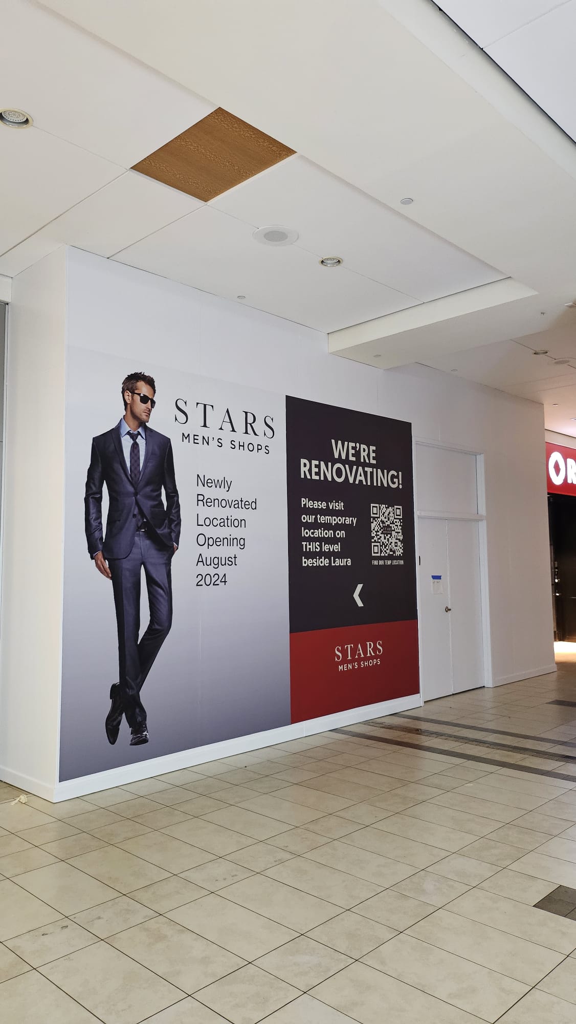 Printed hoarding wall inside a shopping mall