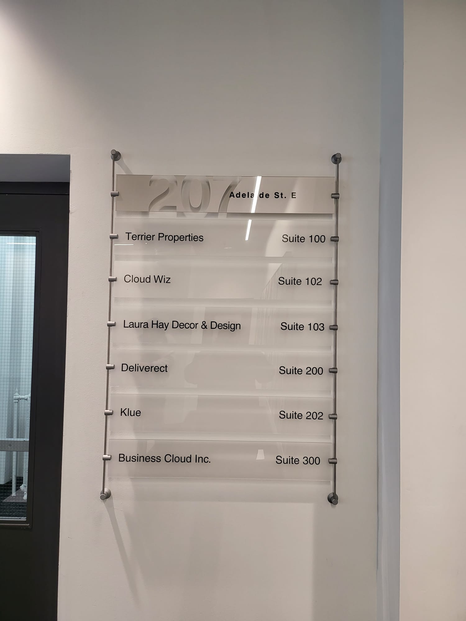 Acrylic suite directory in an office lobby